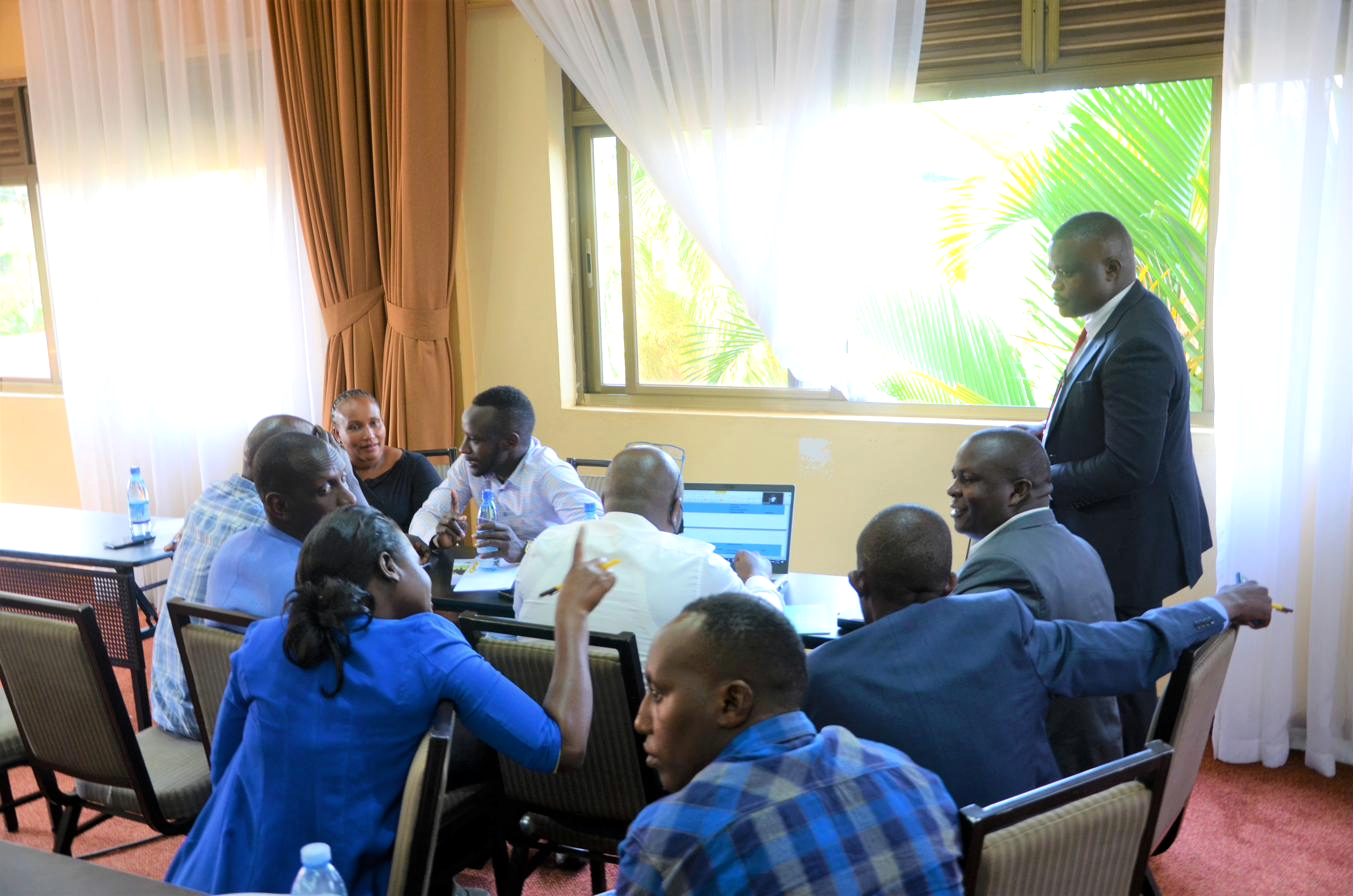 Facilitators managing small group work during a workshop